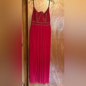 Bandage top pleated dress in the color chili pepper.